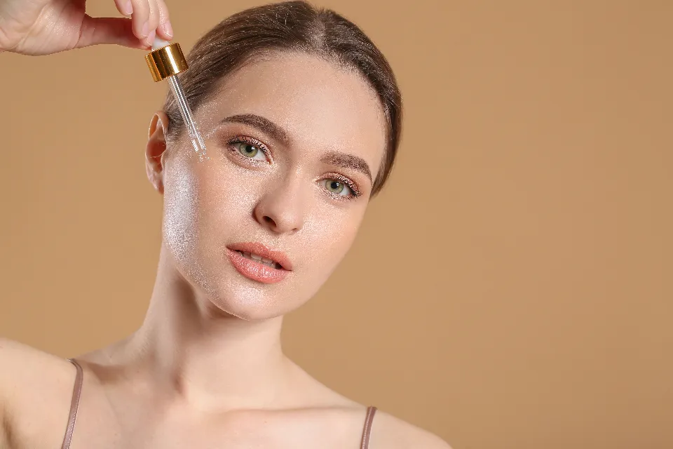 Skincare products arranged on a soft neutral background